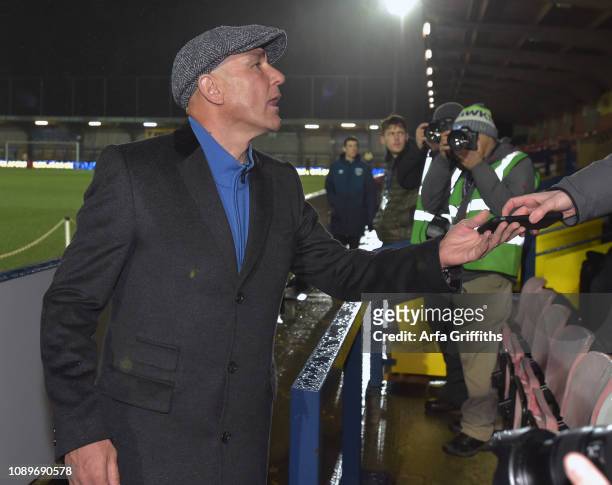 Vinnie Jones once of Wimbledon chats with fans prior to the FA Cup Fourth Round match between AFC Wimbledon and West Ham United at The Cherry Red...