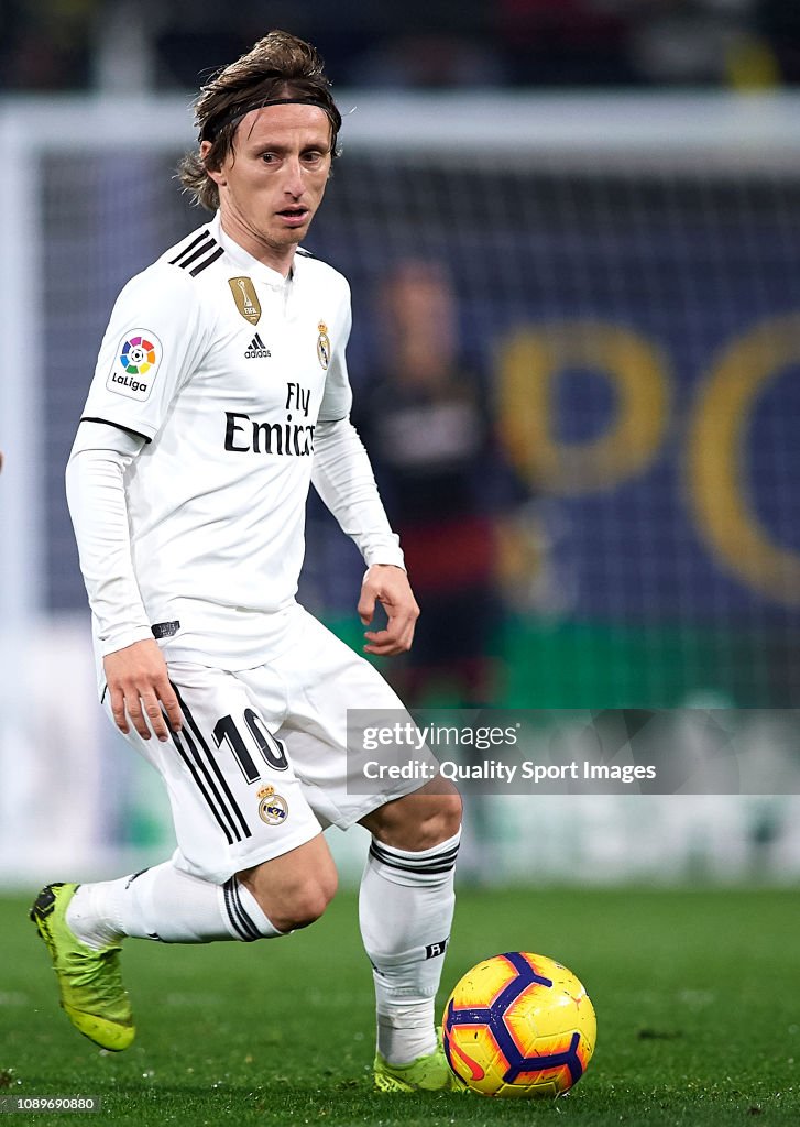 Luka Modric of Real Madrid runs with the ball during the La Liga ...