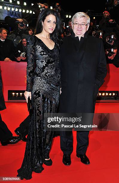 Joschka Fischer and wife Minu Barati-Fischer attend the 'True Grit' Premiere during the opening day of the 61st Berlin International Film Festival at...