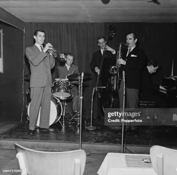 The Ronnie Scott Quintet featuring, from left, trumpeter Jimmy Deuchar, drummer Jackie Dougan, bassist Kenny Napper, saxophonist Ronnie Scott and...