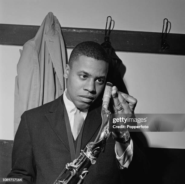 American jazz saxophonist and composer Wayne Shorter pictured backstage prior to performing with Art Blakey and the Jazz Messengers at the Gaumont...