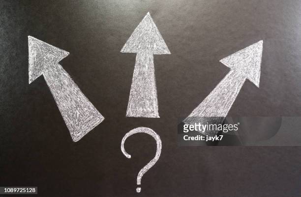 decision making - chalk arrow stock-fotos und bilder