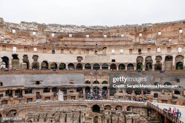 a panoramic image of the roman colosseum in rome, italy - palatine hill stock pictures, royalty-free photos & images