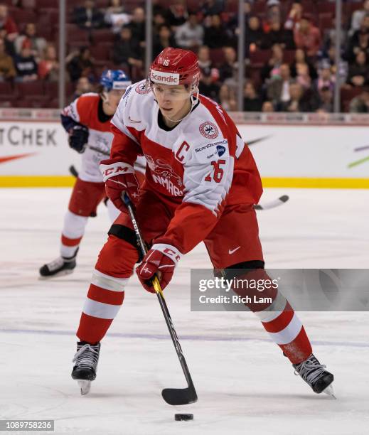 Jonas Rondbjerg of Denmark skates with the puck in Group A hockey action of the 2019 IIHF World Junior Championship against the Czech Republic on...