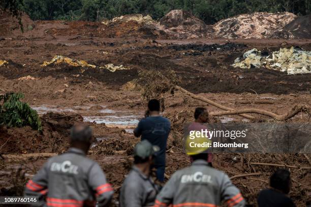 Residents survey damage after a Vale SA dam burst in Brumadinho, Minas Gerais state, Brazil, on Saturday, Jan. 26, 2019. A Brazilian judge has...
