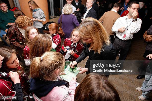 Professional soccer player Kristine Lilly signs autographs during the HBO Documentary Screening of "Kick Like A Girl" at HBO Building on November 20,...