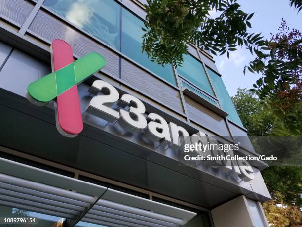 Sign with logo on facade of personal genomics company 23andMe in Mountain View, California, October 28, 2018.