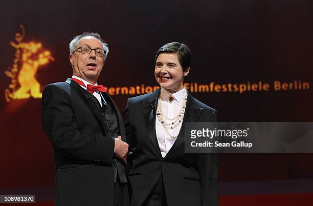 Jury member Isabella Rossellini and festival director Dieter Kosslick talk at the grand opening ceremony during the opening day of the 61st Berlin...