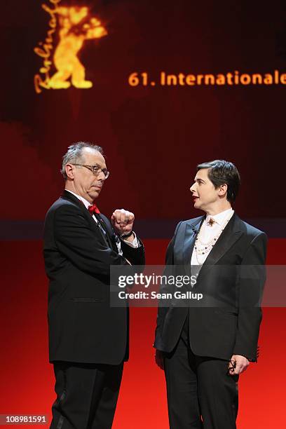 Jury member Isabella Rossellini and festival director Dieter Kosslick talk at the grand opening ceremony during the opening day of the 61st Berlin...