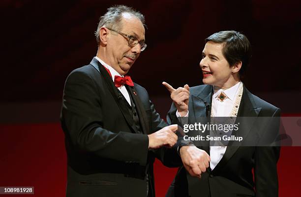 Jury member Isabella Rossellini and festival director Dieter Kosslick talk at the grand opening ceremony during the opening day of the 61st Berlin...