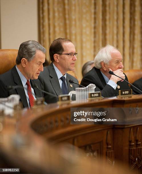 Wally Herger, R-CA., Chairman Dave Camp, R-MI., and Sander Levin, D-MI., during the House Ways and Means hearing on health care law and medicare in...