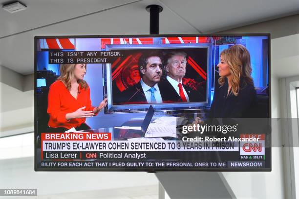 Television monitor at Dallas/Fort Worth International Airport shows a CNN news broadcast with CNN anchor Brooke Baldwin on the day President Trump's...