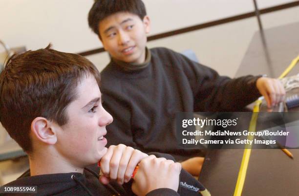 Nick Schlag , left, and Yiming Wang, students at Boulder High School, concentrate on multiple-choice questions posed to them in preparation for the...