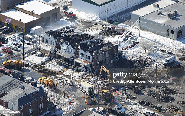 The debris can be seen in the 500 block of 13th Street after a house exploded, Thursday, February 10 in Allentown, Pennsylvania.