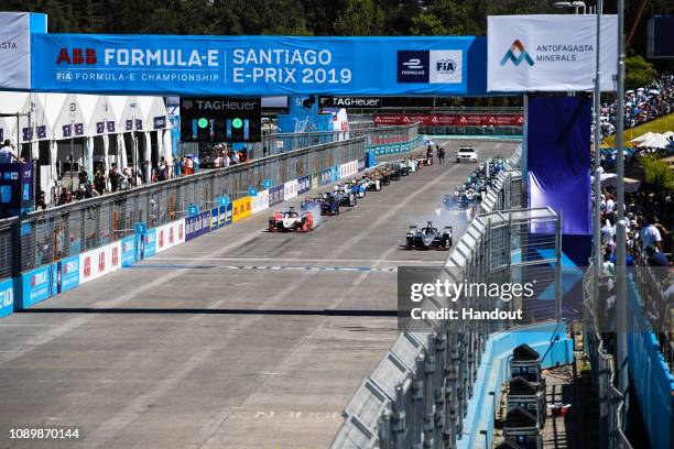 Cars prepare to take their grid slot, with Sébastien Buemi , Nissan e.Dam, Nissan IMO1, and Pascal Wehrlein , Mahindra Racing, M5 Electro, on the...