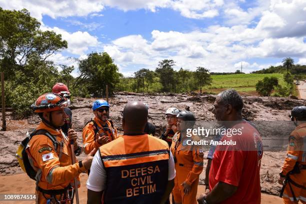 Rescue workers are seen at the scene after a tailings dam collapsed at an iron ore mine in Brumadinho, state of Minas Gerias, in southeastern Brazil,...