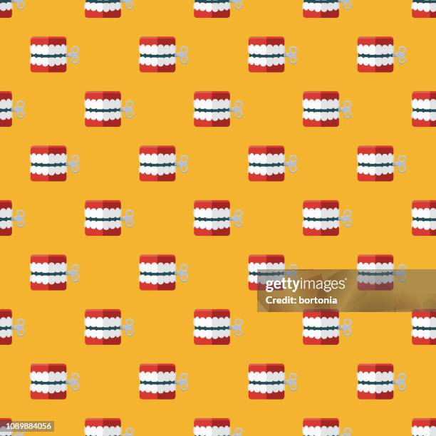 wind-up teeth april fools' day seamless pattern - april fools background stock illustrations