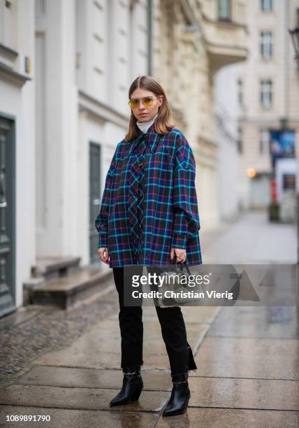 Swantje Soemmer is seen wearing blue checked Missoni jacket, black ripped denim jeans Boden, Marc Jacobs sunglasses, AGL cowboy boots, Longchamp bag...