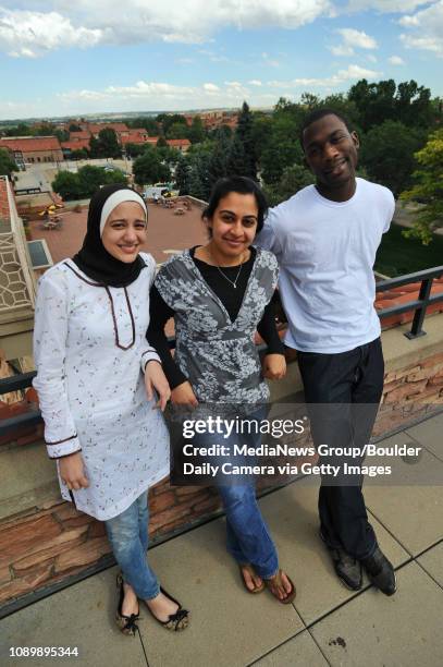 University of Colorado students, from left, Saira Siraj, Amana Malik and Rasheed Lawal are members of the Muslim Students Association, and they are...