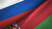 Belarus and Russia two flags together realations textile cloth fabric texture
