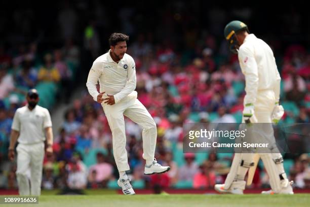 Kuldeep Yadav of India celebrates dismissing Usman Khawaja of Australia during day three of the Fourth Test match in the series between Australia and...