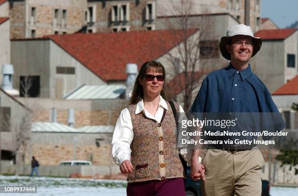 April 12, 2005 / Boulder Colo / Eric Cornell and his wife Celeste Landry walk toward the Coors Event Center to meet with the media to talk about...