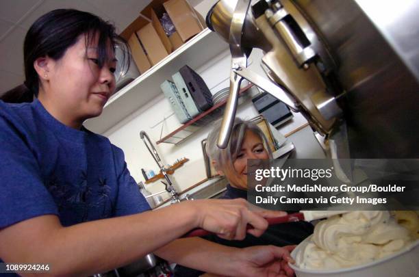 March 13, 2006/ Boulder/ Kim Troy, right, and Jonylee Sato ready a batch of Rum Raisin ice cream to be sold at King Soopers March 13, 2006. Troy...