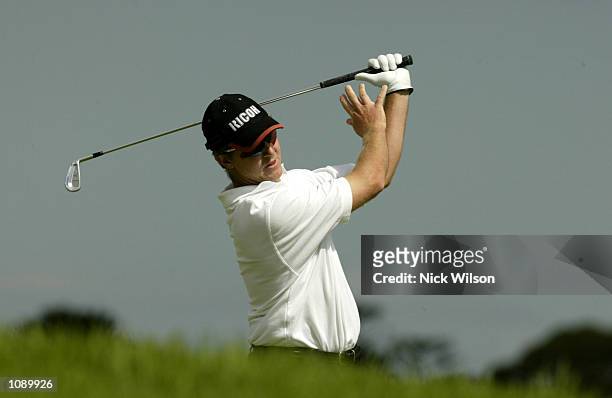 Scott Laycock of Australia hits his second shot on the 17th hole during the final round of the ANZ Championship being played at the Lakes Golf Club...