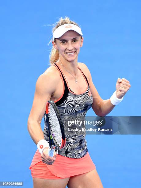 Lesia Tsurenko of Ukraine celebrates after winning the match against Naomi Osaka of Japan during day seven of the 2019 Brisbane International at Pat...