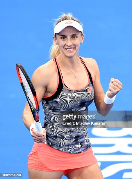 Lesia Tsurenko of Ukraine celebrates after winning the match against Naomi Osaka of Japan during day seven of the 2019 Brisbane International at Pat...