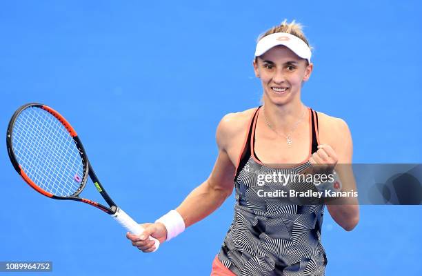 Lesia Tsurenko of Ukraine celebrates after winning the match against Naomi Osaka of Japan during day seven of the 2019 Brisbane International at Pat...