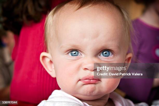 a different side - funny face baby stock pictures, royalty-free photos & images