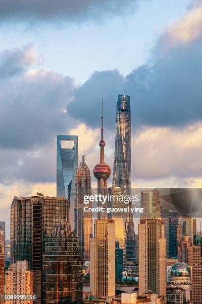 panoramic skyline of shanghai - schanghai stock-fotos und bilder