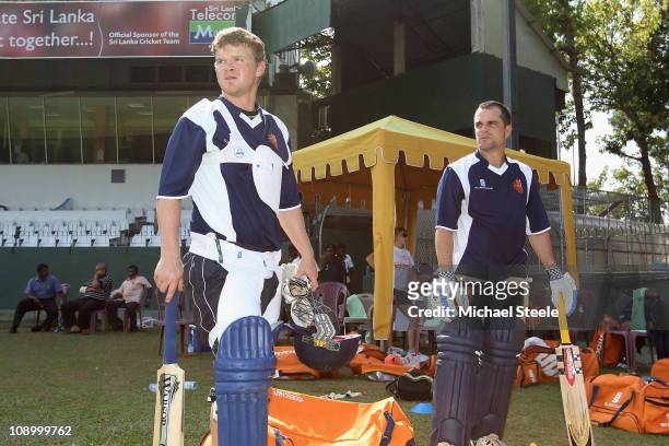 Tom de Grooth and captain Peter Borren wait their turn to bat during the Netherlands practise session at the Sinhalese Sports Club on February 11,...