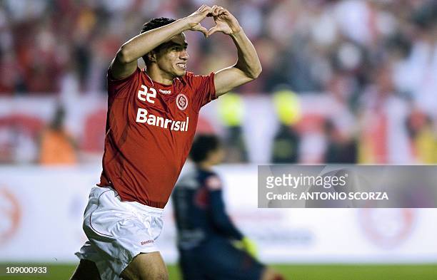 Brazil's Internacional player Leandro Damiao celebrates his goal against Mexico's Chivas on August 18, 2010 during their Libertadores final football...
