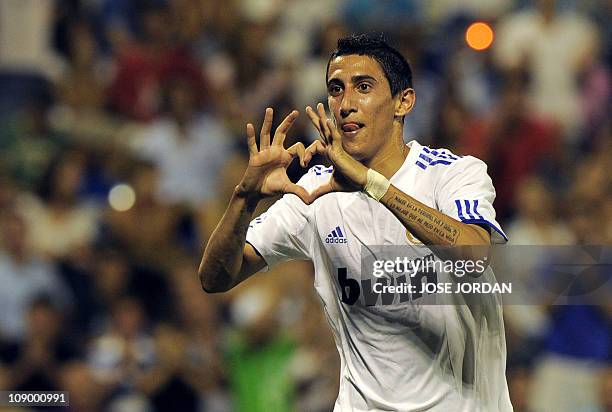 Real Madrid's Angel Di Maria from Argentina celebrates his goal against Hercules during their friendly football match at Rico Perez stadium in...