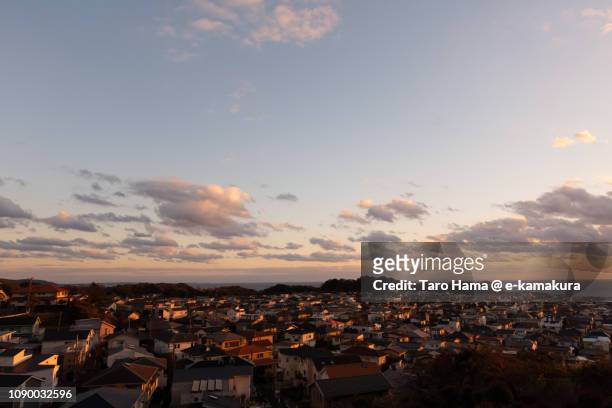 residential town by the sea in kamakura city in japan - japan sunrise stockfoto's en -beelden