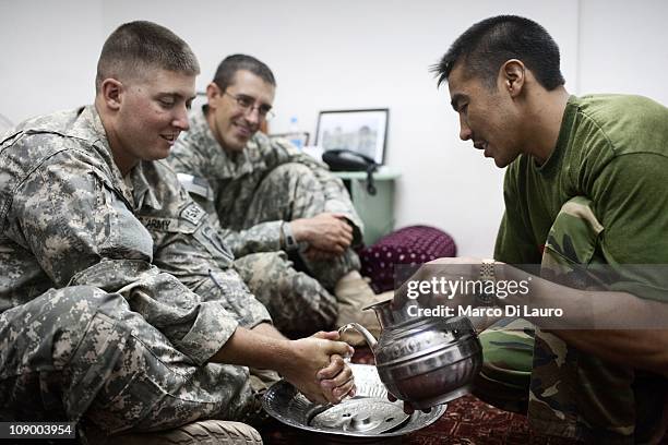 From left, Us Army SPC Joshua Kitzmiller, 21 from Utah from US Army PRT Khost Civil Affairs Team and SSG Adam Peters from Utah, from US Army PRT...