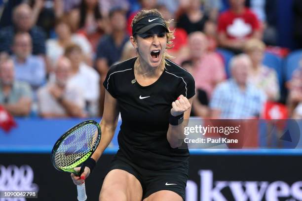 Belinda Bencic of Switzerland celebrates winning a game during the women's singles finals match against Angelique Kerber of Germany on day eight of...