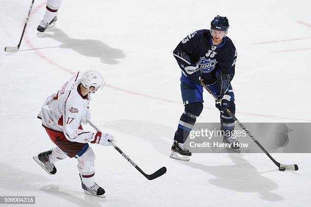 Henrik Sedin of the Vancouver Canucks and Team Lidstrom plays against Ryan Kesler of the Vancouver Canucks and Team Staal in the 58th NHL All-Star...