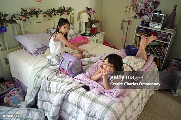 Mike and Leigh Anne Harrington and their adopted daughter Meredith Ellen are visited by her twin sister Meredith Grace Ann Rittenhouse at the...