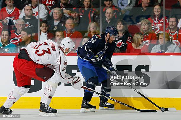 Martin Havlat of the Minnesota Wild controls the puck against Zdeno Chara of the Boston Bruins and Team Staal in the 58th NHL All-Star Game at RBC...