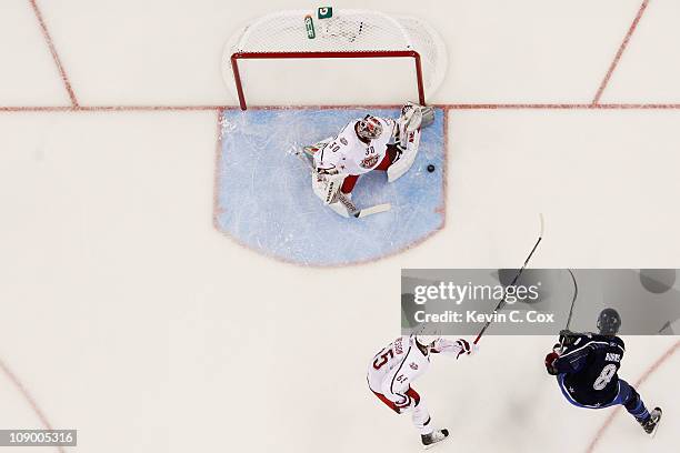 Cam Ward of the Carolina Hurricanes and Team Staal defends against Brent Burns of the Minnesota Wild and Team Lidstrom in the 58th NHL All-Star Game...