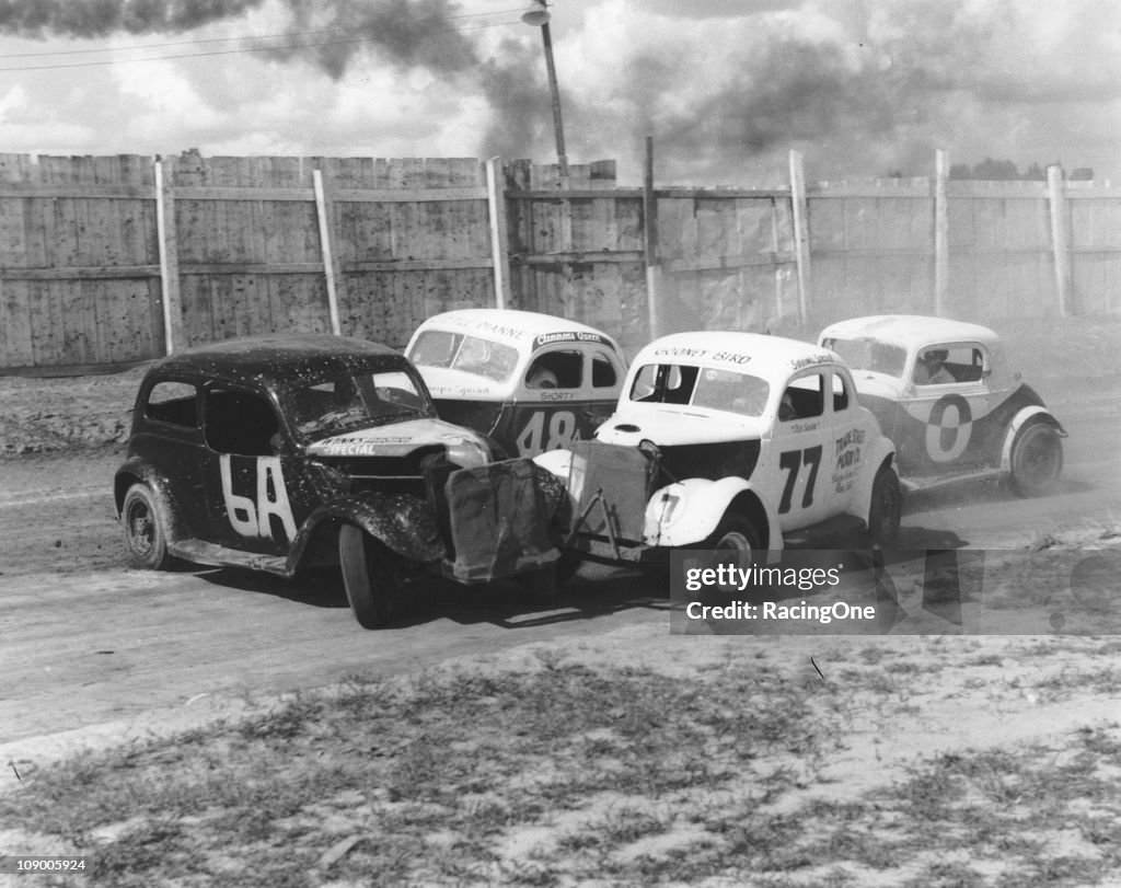 Modified Racing 1950 Modified stock car action on a dirt track from the early 1950s has ...