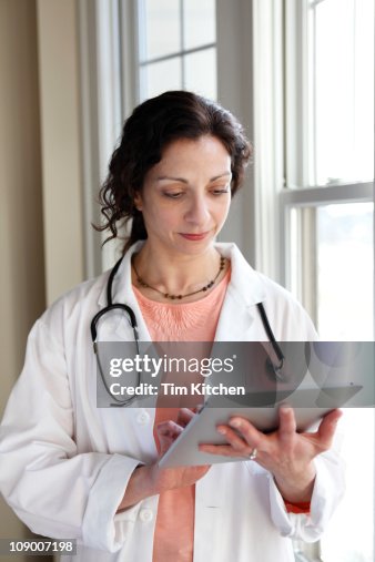 Doctor using digital tablet Doctor using digital tablet