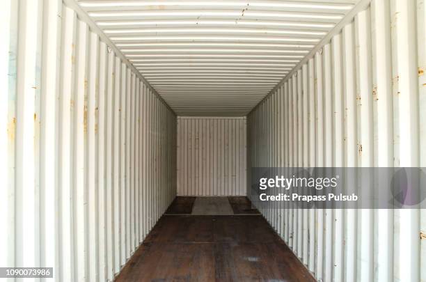 abstract empty in side container with  white light outside. - cargo container texture stock pictures, royalty-free photos & images