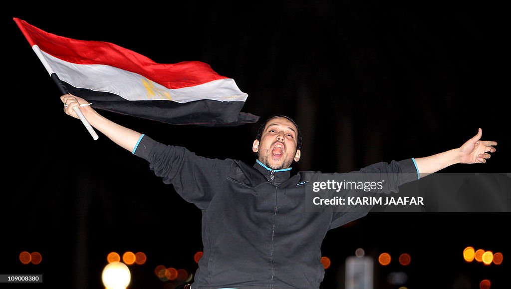 A man waves an Egyptian flag as the Egyp