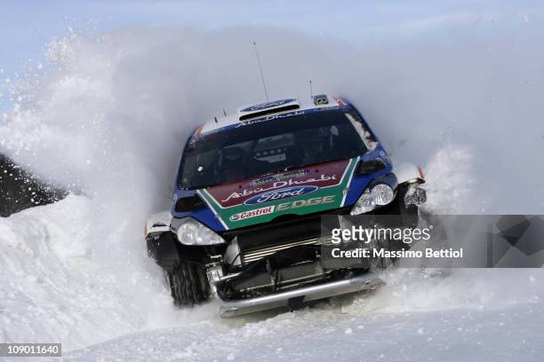 Jari Matti Latvala of Finland and Mikka Anttila of Finland compete in their Ford Abu Dhabi World Rally Team Ford Fiesta RS WRC during day one of the...