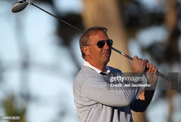 Actor Kevin Costner tees off from the 10th hole at the AT&T Pebble Beach National Pro-Am- Round Two at the Spyglass golf club on February 11, 2011 in...