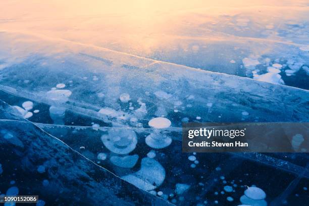 dramatic view of the sayram lake in winter - winter wilderness stock pictures, royalty-free photos & images